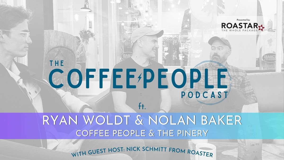 Header image of three gentlemen smiling and chatting while sitting in a cafe.