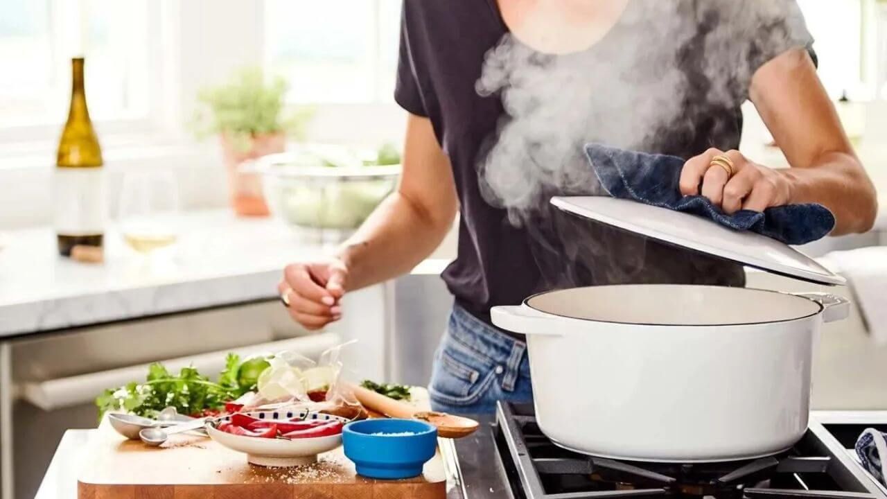 Women cooking with a Dutch oven