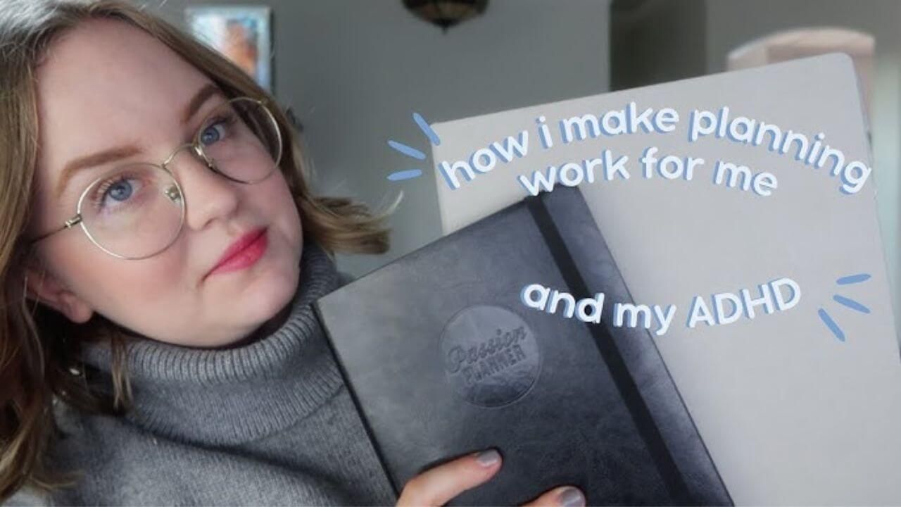 Woman showing the bullet journal she uses for ADHD