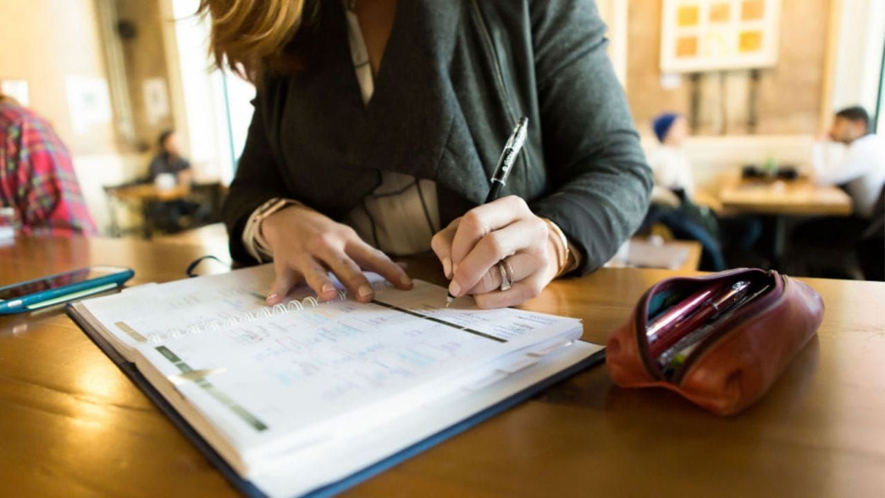Woman using an ADHD Planner