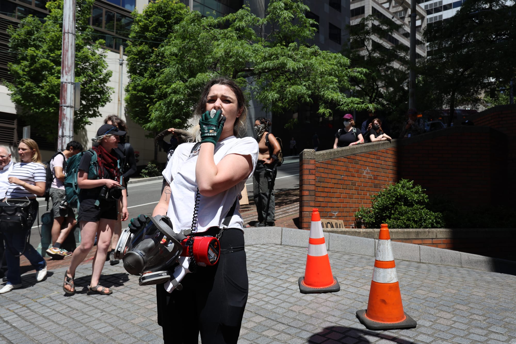 protester holding microphone while chanting