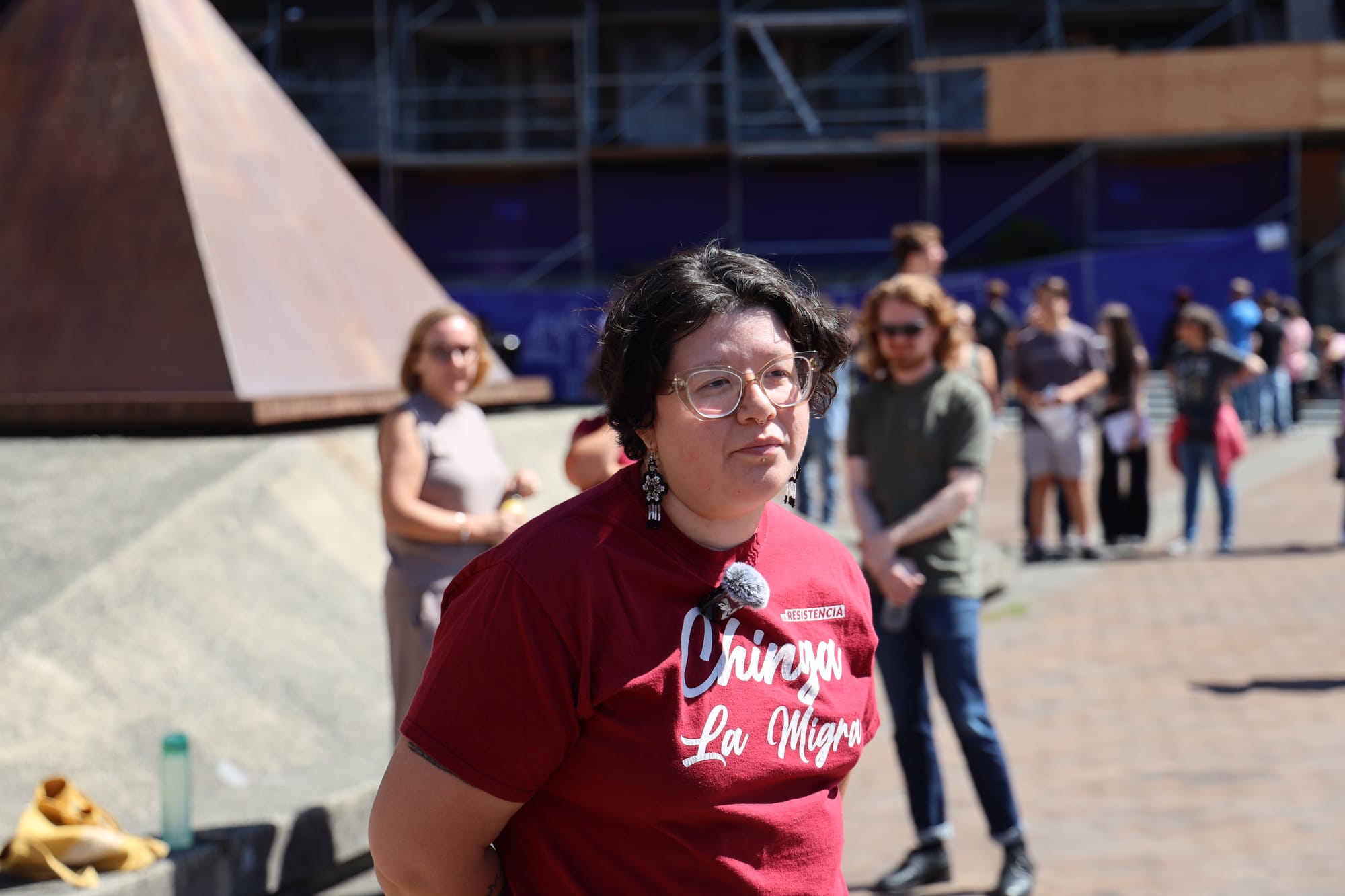 Person in red facing the camera