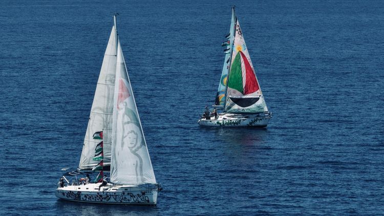 photo shows two aid ships sailing