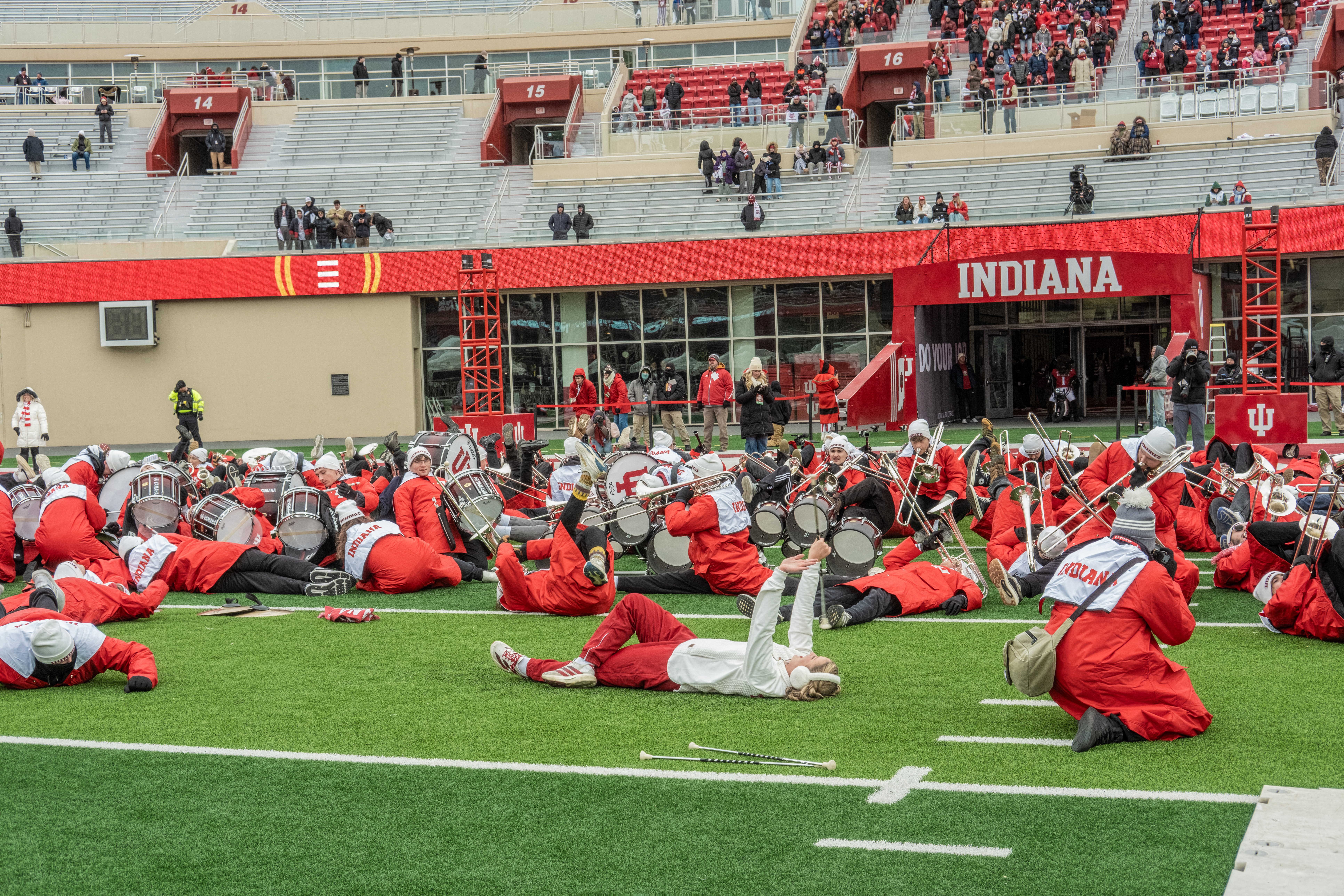 The marching band performs "Shout" by The Isley Brothers at the ceremony on Saturday. The physical choreography mimics the song's refrain of "(Shout) a little bit softer now / (Shout) a little bit louder now."