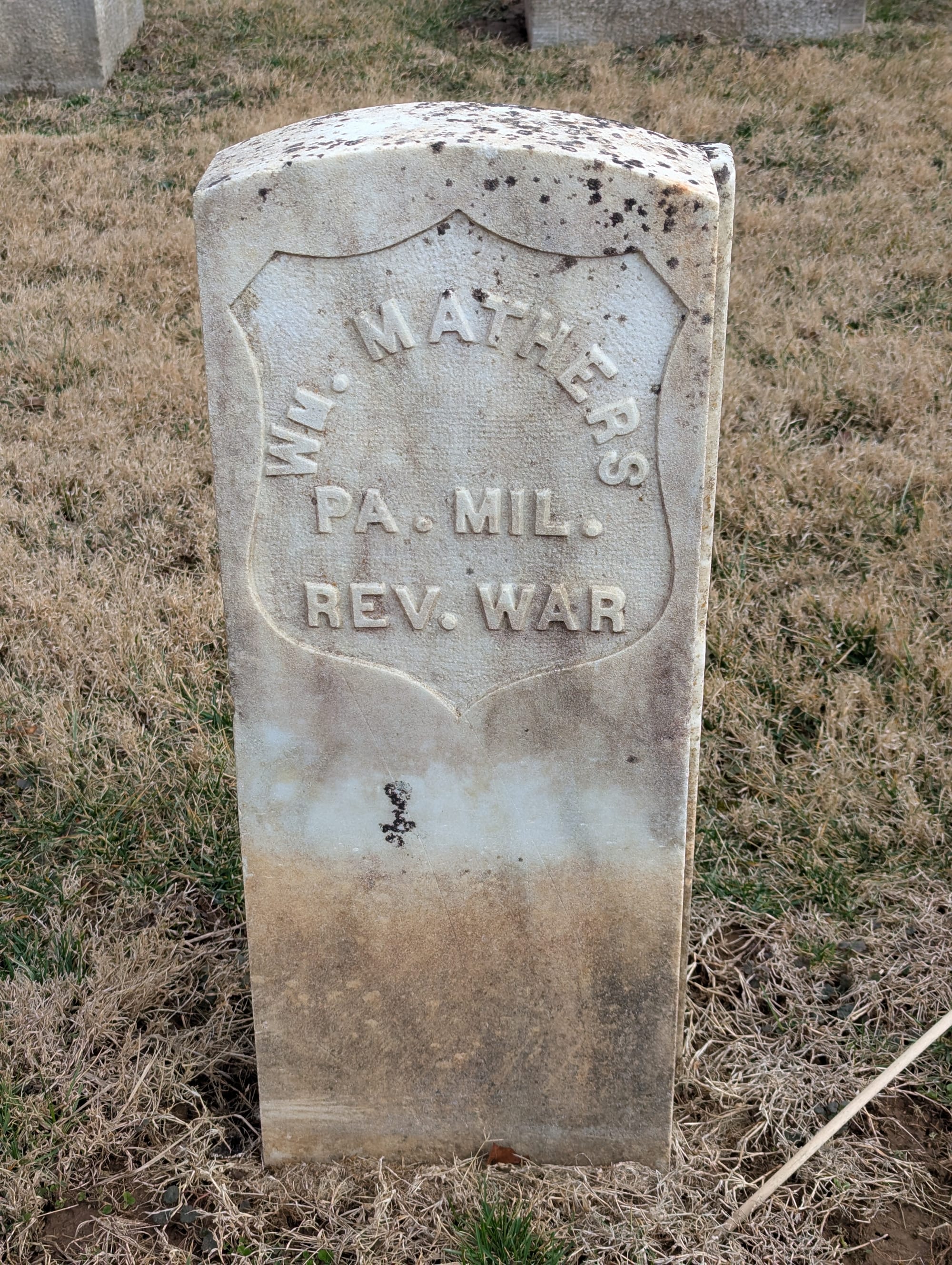 white gravestone with words WM. MATHERS PA. MIL. REV. WAR