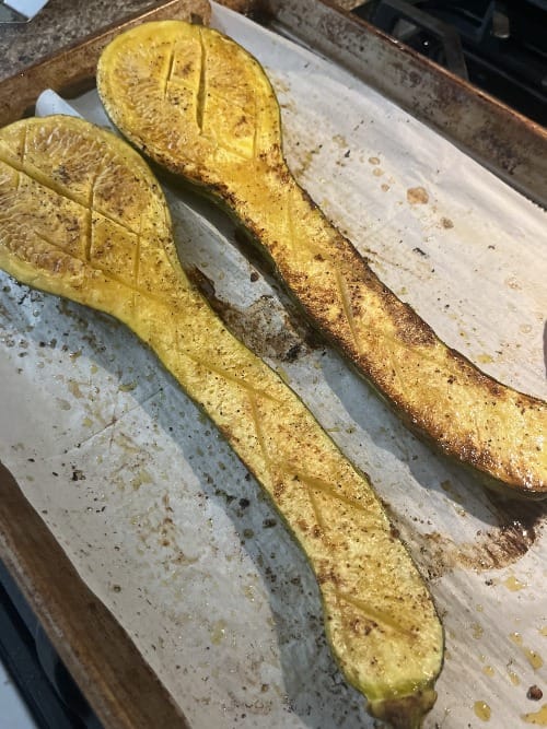 a long squash, cut in half and roasted