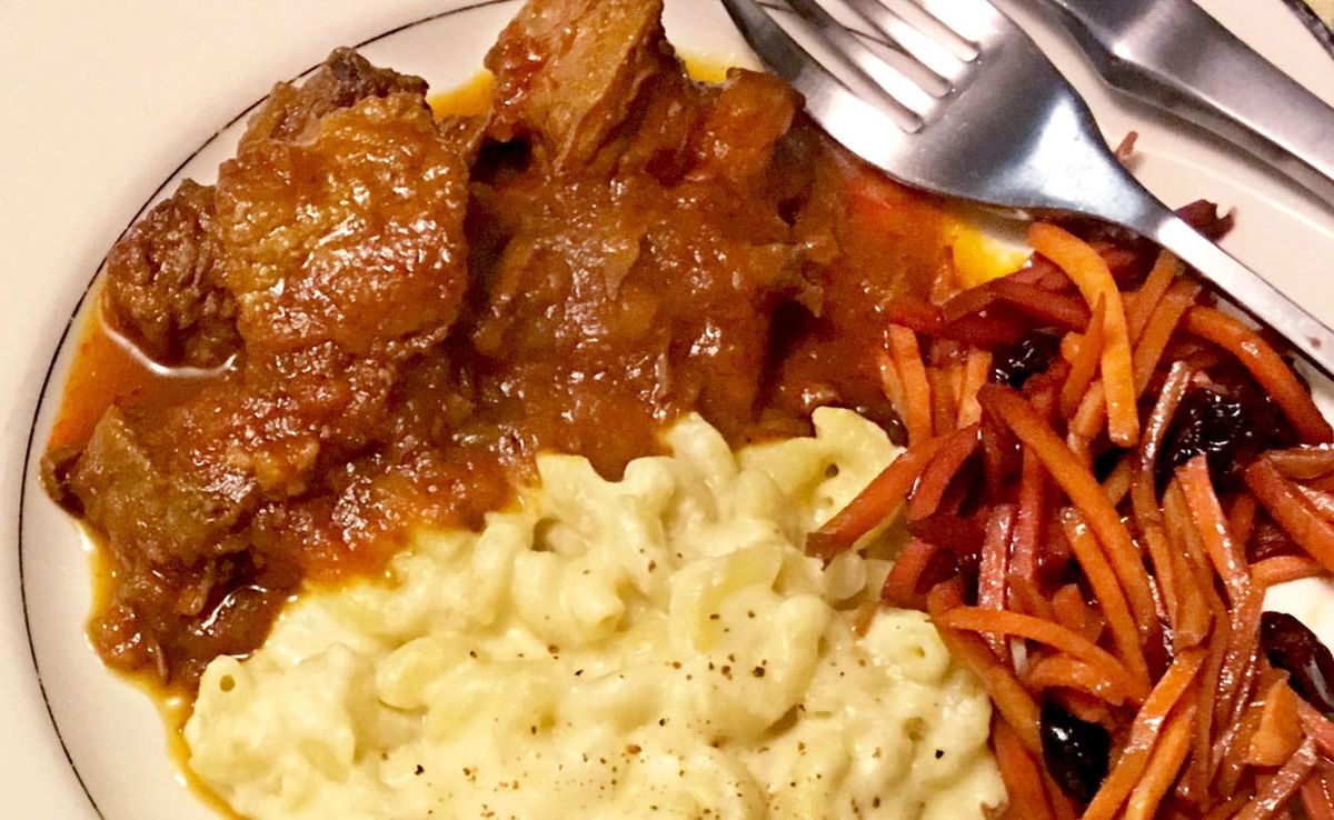 (clockwise from top left) Ruthie Cohen's beef stew, carrot salad with dried cherries, and macaroni and cheese. | Photo by Rut