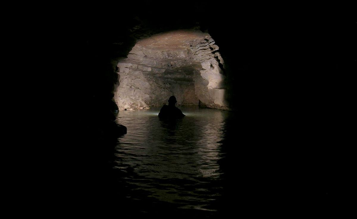 Samuel Frushour and his cave-diving peers have mapped miles of aquatic caves in southern Indiana. While Hoosier caverns might