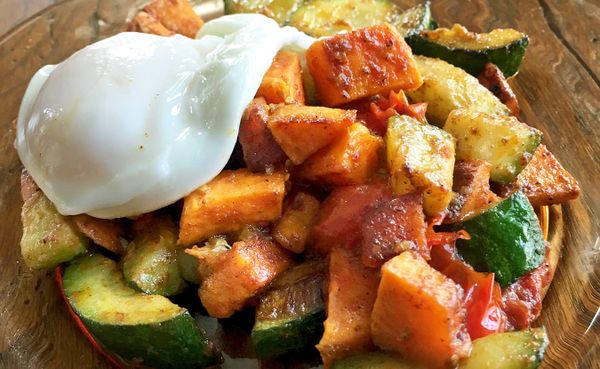 The often-ignored zucchini gets center stage in Ruthie Cohen's Zucchini and Sweet Potato Hash with Eggs recipe. | Photo by Ru