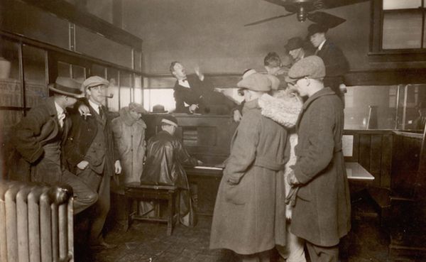 Hoagy Carmichael sits at the piano surrounded by friends in the Book Nook on Indiana Avenue, sometime in the 1920s. | Photo c