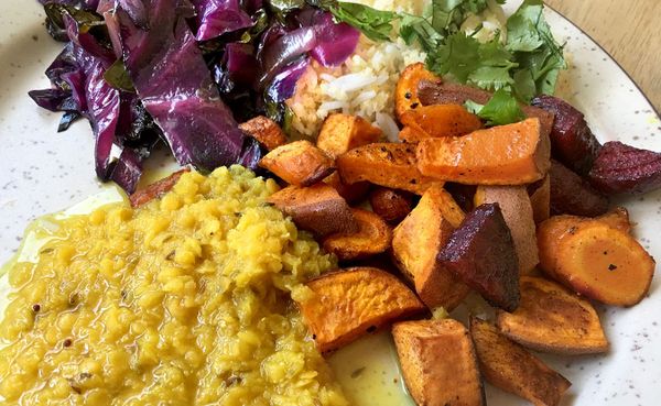 Health educator and certified Ayurvedic practitioner Kristin Londergan’s roasted root veggies and red lentil dal with cabbage