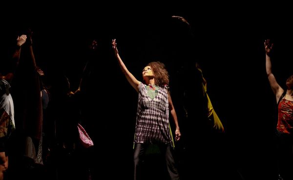 Kim Morris Newson, center, dances with the IU African American Dance Company in their Potpourri of the Arts concert, November