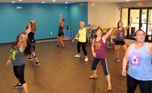 Writer Jennifer Pacenza, pictured far right at a Bollywood dance class, spoke with experts who say a body-positive fitness mo