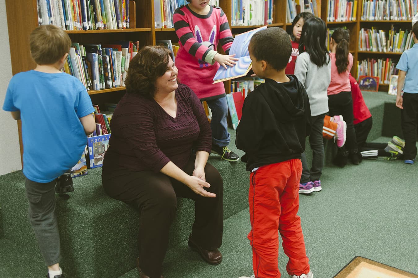 D'Eliso works with University School students in the Media Room. | Photo by Natasha Komoda
