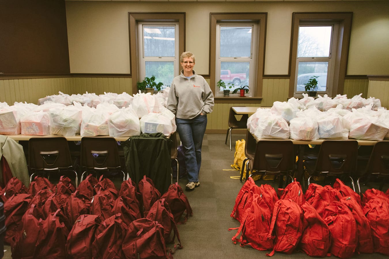 Vicki Pierce, executive director of Community Kitchen of Monroe County, oversees many programs fighting food insecurity, including sit-down meals at their South Rogers Street location and the Backpack Buddies program that sends backpacks of food home with local food-insecure children for the weekend. | Photo by Natasha Komoda