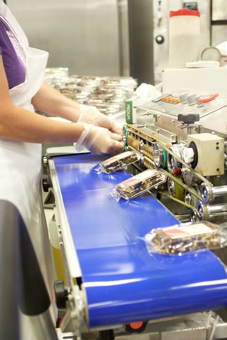 UGo Bars' production and distribution, pictured here, were previously divided between multiple locations. Once renovations are complete, they will be able to consolidate everything into one location. | Photo by Jonna Mary Yost