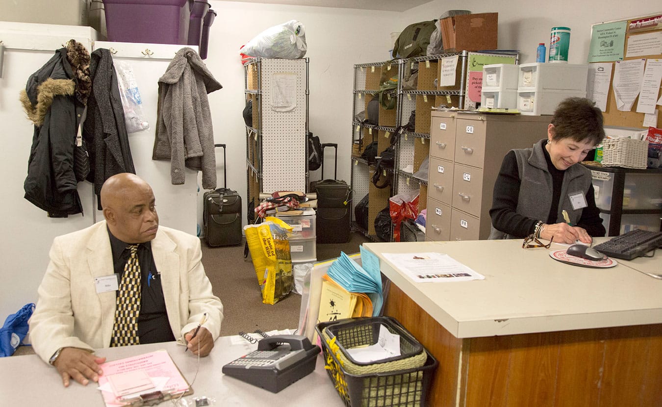 Mike Byrd (left) and Bev Vicstein volunteering at Shalom. | Photo by TJ Jaeger