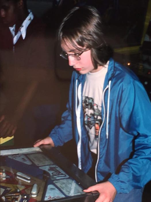Johnson, playing pinball in the late 1970s, at about the age he caught a bus to Ontario, by himself,&nbsp;“to live off the land.”&nbsp;| Courtesy photo