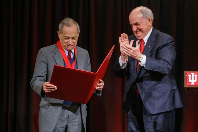 Rosenfeleceived thresident’s Medal foxcellence from Indiana University President Michael A. McRobbie (r) in 2019. | Photo by IU Communicationnd Marketing
