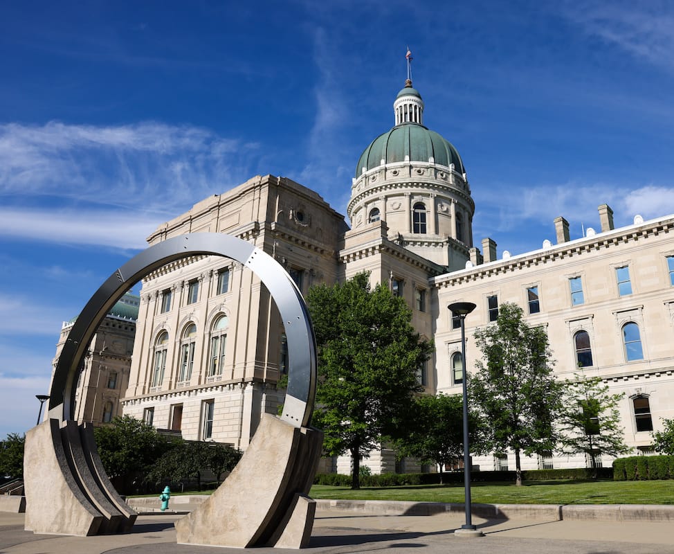 Olson said legislators in the Indiana Statehouse (above) are concerned and skeptical about renewables and coal plant retirements. But, he said, because utilities are driving the movement toward renewable energy, “it makes it easier for conservative venues like Indiana to accept a necessary transition to renewables.” | Photo by Benedict Jones