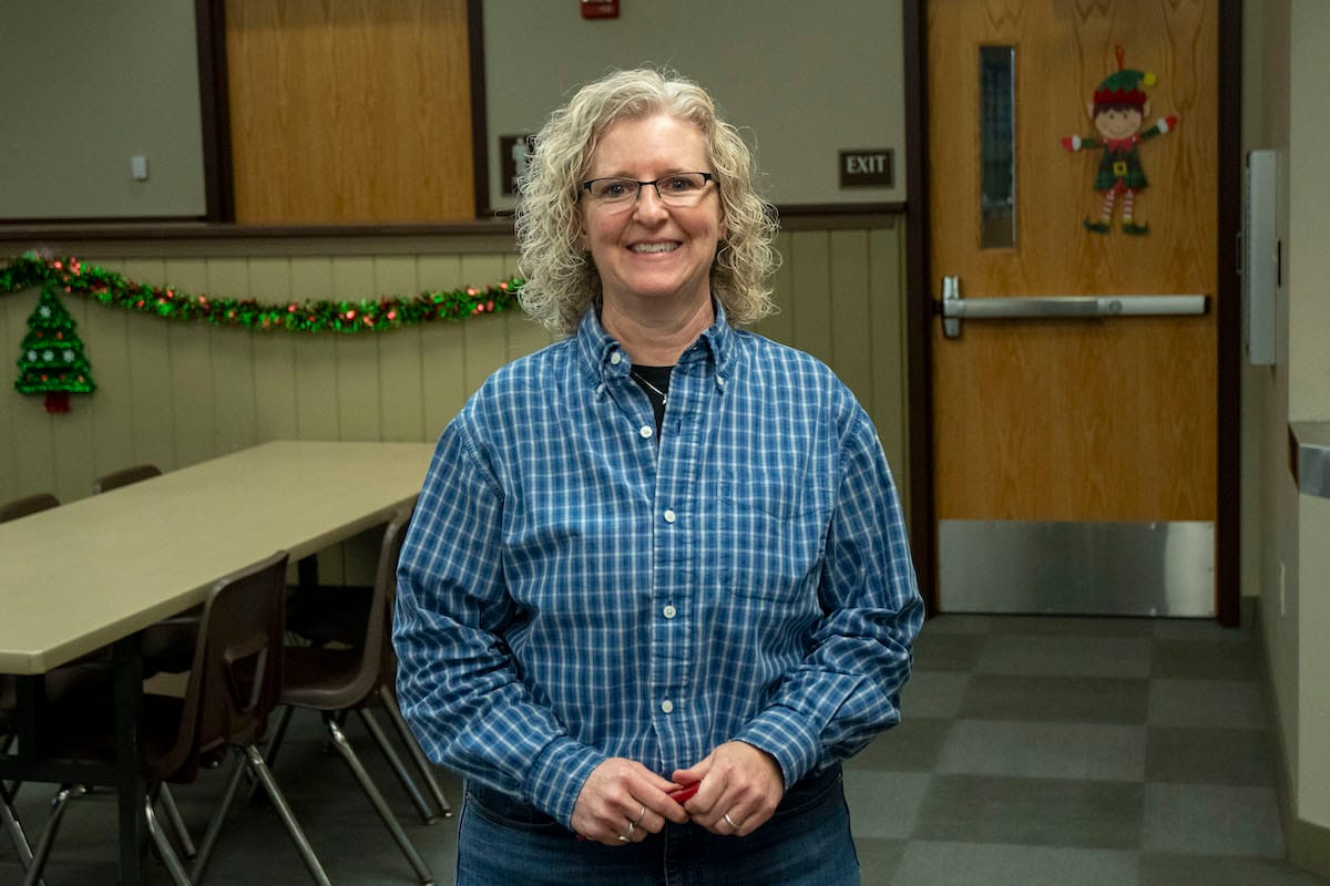 Vicki Pierce, executive director of Community Kitchen of Monroe County, in the facility’s dining room. | Photo by Olivia Bianco
