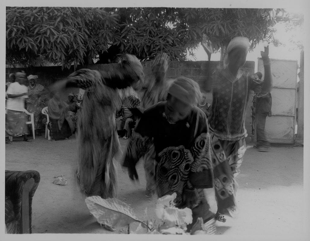 Les Femmes qui ont Récupéré (Women in Recovery), N’Zerekore, Guinea, 2009, Gelatin Silver Print. Women celebrate their recovery after suffering fistulas due to Female Genital Mutilation. Women are often ousted from their village when they become ill after FGM, as their family believes them to be cursed. These women found their way to a fistula clinic which teaches women a trade as a means to make a living, as their family will rarely accept them back.