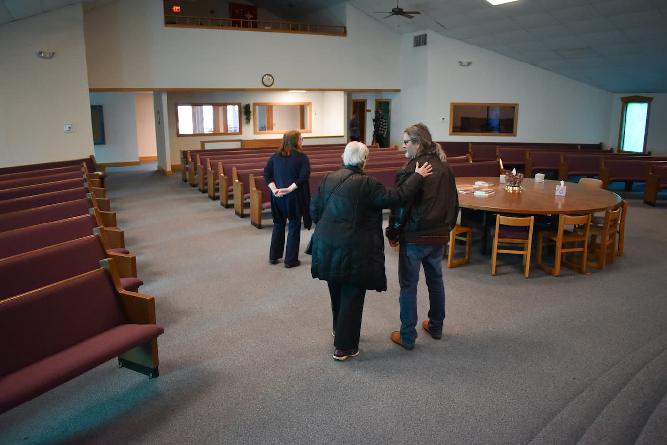Lida Baker, one of Harmony’s board members, congratulates Rick on how far the project has come. “It’s a blessing for me, I’ll tell you,” she said. “Who knew, all those years ago when you came here, that this would be what it will be?” | Photo by Haley Miller