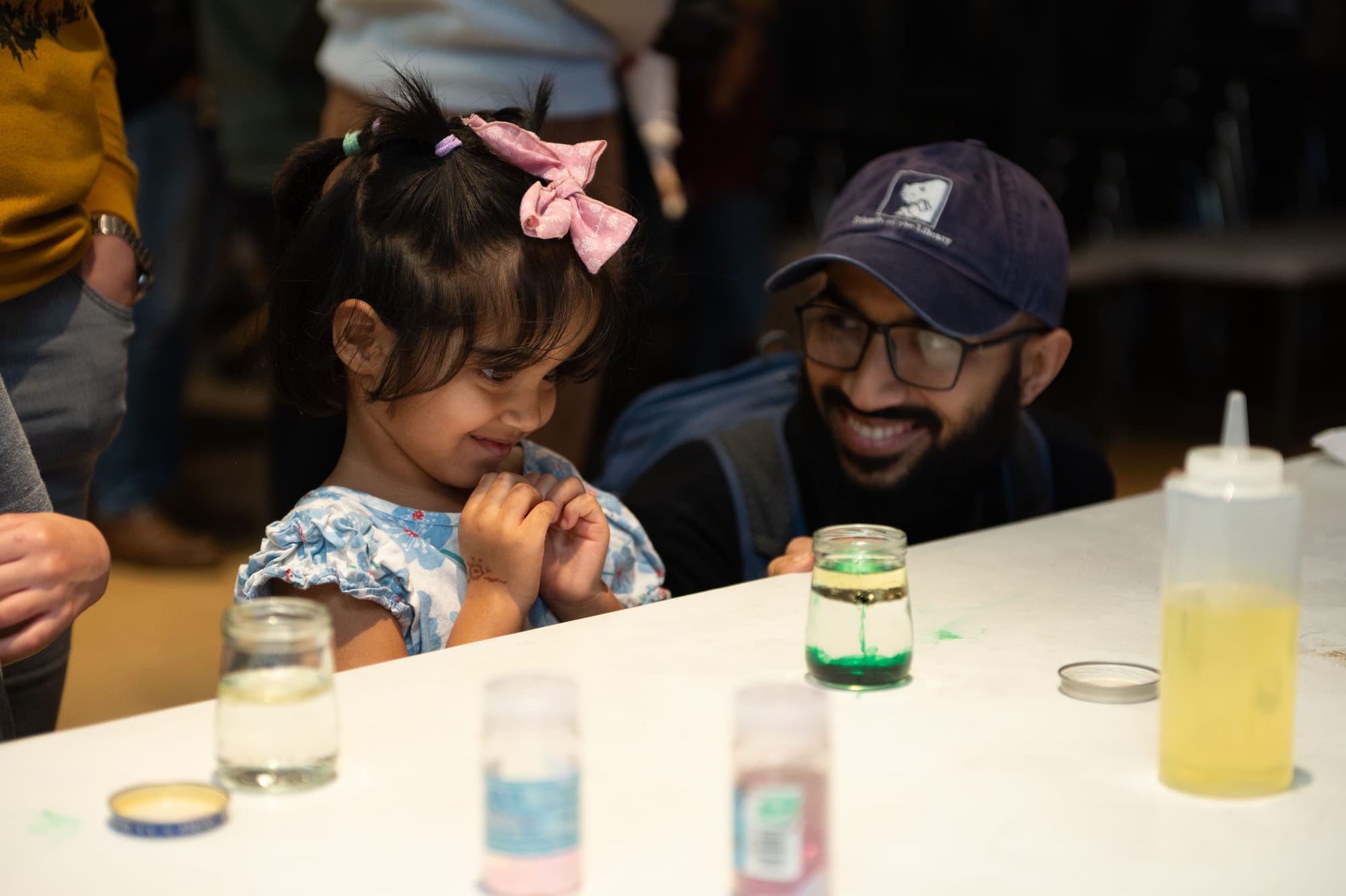 WonderLab visitors watch a "Fireworks in a Jar" demonstration on New Year's Eve. | Photo courtesy of WonderLab