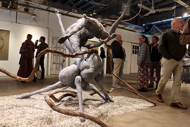 “Use Your Words” was the central piece to Cooper Pennington’s exhibition at the I Fell Gallery. It is “an abstraction morphing human anatomy with the legs and hooves of horses,” writes Cookman. Cooper Pennington says the title is “my constant desire for the world, that we stop wrestling and learn to communicate with each other.” | Photo by Claude Cookman