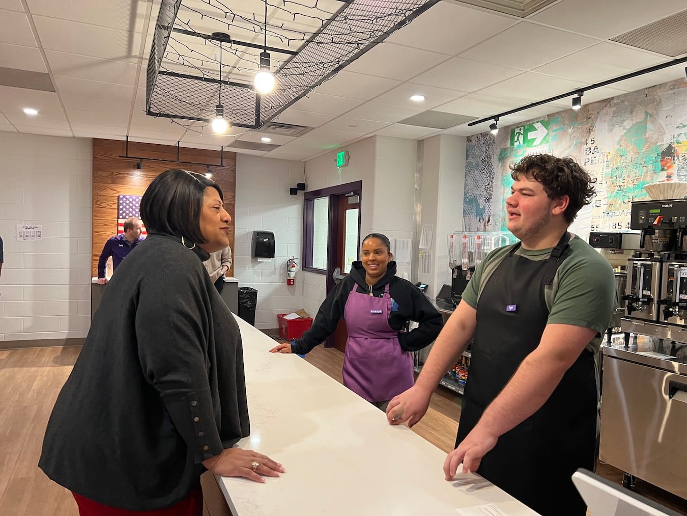 Dr. Markay Winston at Bloomington High School South talking to students in the student-run Scholar Sips Cafe. | Photo by Sarah DeWeese