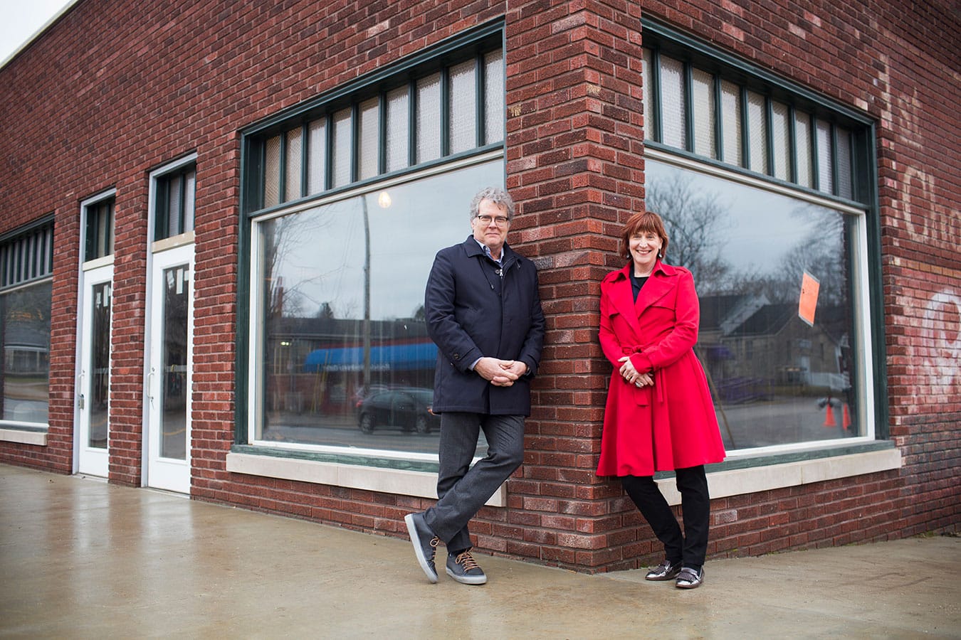 David and Martha Moore stand outside of the FAR Center for Contemporary Arts at West Fourth and South Rogers streets, just prior to its grand opening in 2018. | Photo by Chaz Mottinger