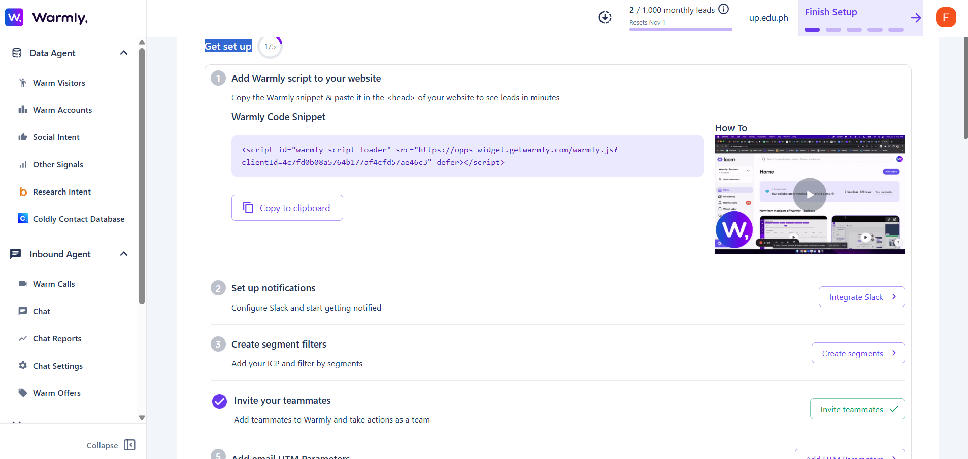 Screenshot of Warmly AI’s setup interface with instructions to copy and paste the tracking script into a website’s header and options to integrate Slack, create segments, and invite teammates.