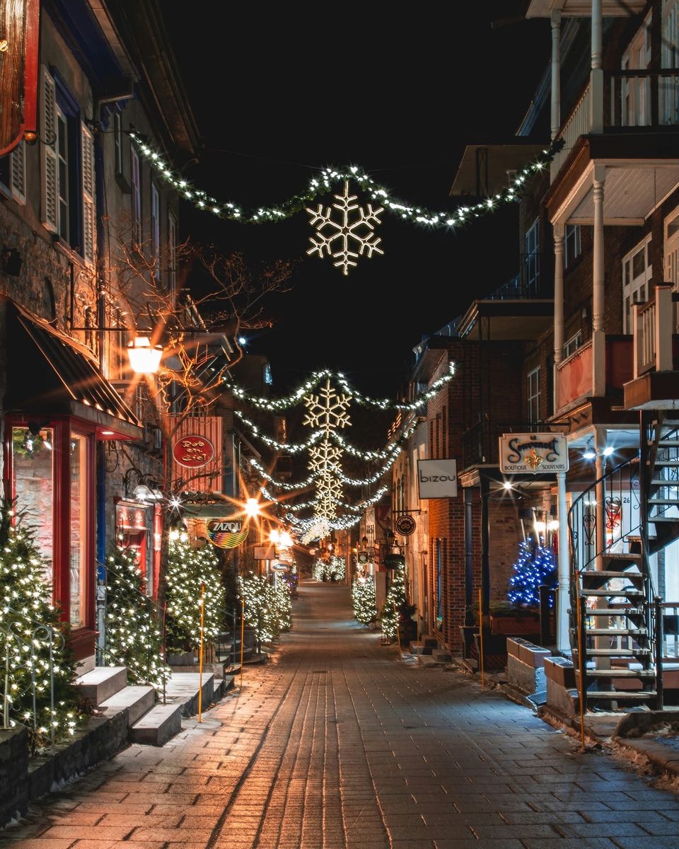 Holiday Street Lights (From https://unsplash.com/photos/a-city-street-is-decorated-with-christmas-lights-W1fjsX7vdXs)