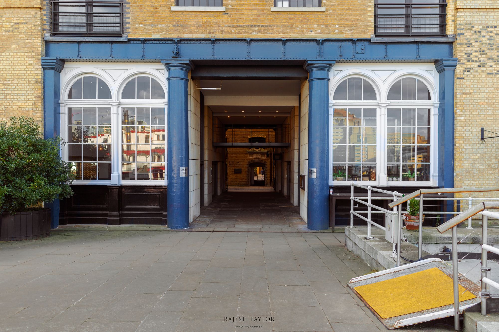 Porters Lodge Archway leads into Butler's Wharf Pier © Rajesh Taylor