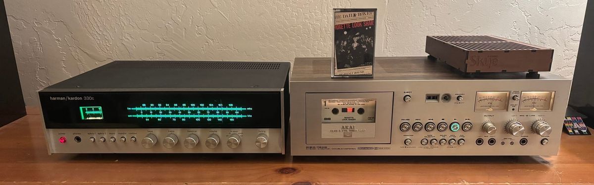 A photo of Ava's current favorite way to listen to music. Harman Kardon 330c and Akai GXC-760D. Speakers not shown.