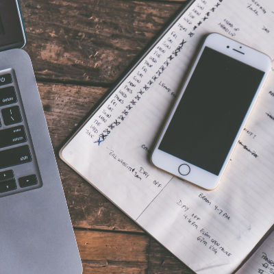 phone and paper schedule
