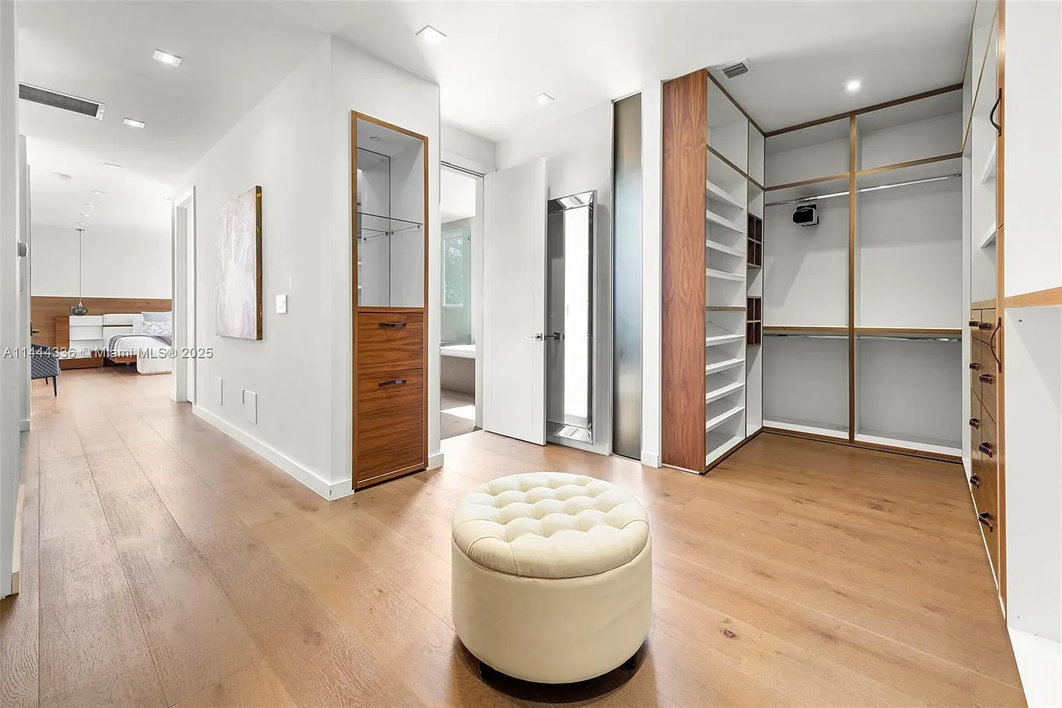 From this angle, honey floors, built-in closet left, everything lined up tidy.