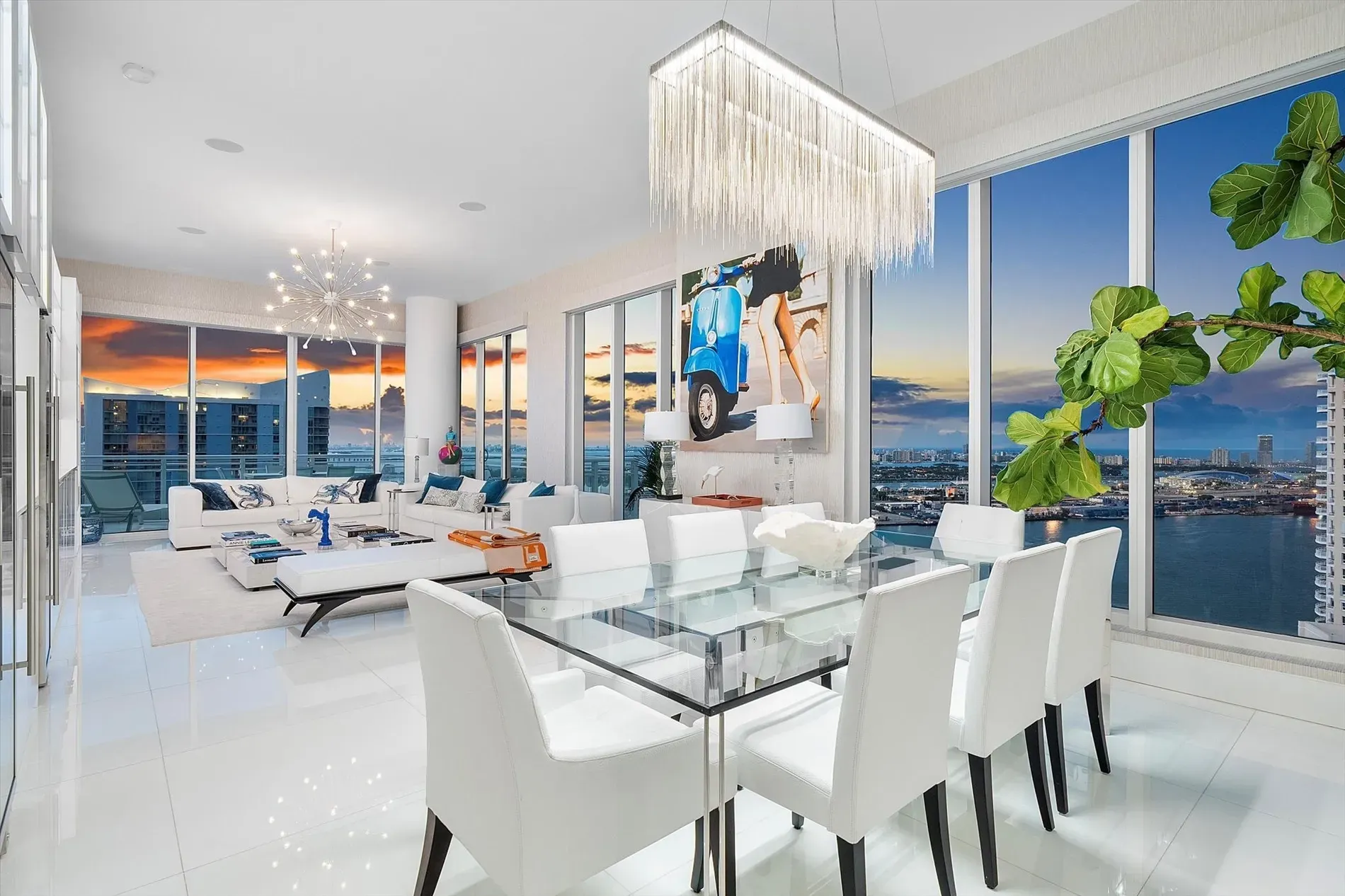 Open living/dining feels airy. That dusk view’s doing the heavy lifting.