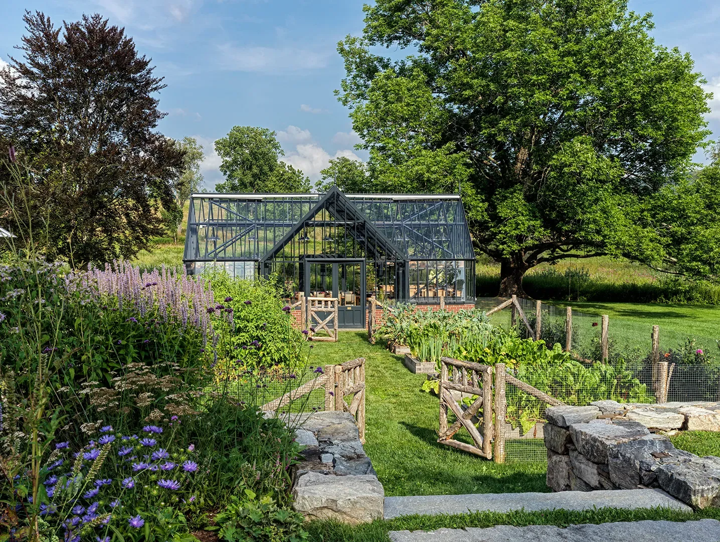 And then another greenhouse—A-frame vibes. Pretty, but do plants judge me?