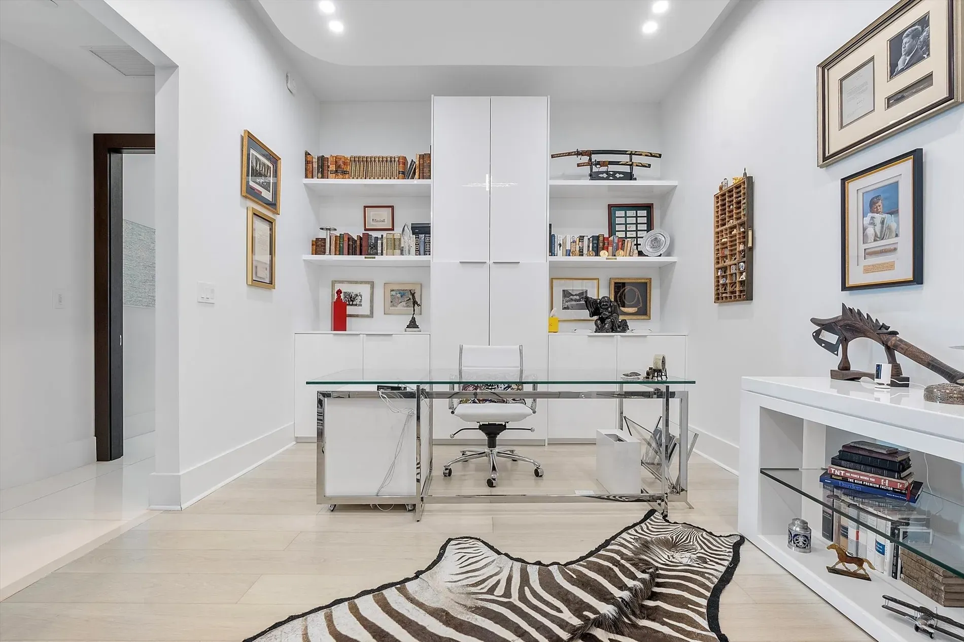 Office set-up. white walls, light floors. Clean, maybe too spotless to brainstorm?