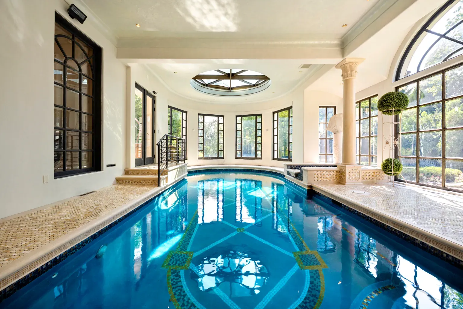 Indoor pool with soaring arches. From this angle, light just floods.