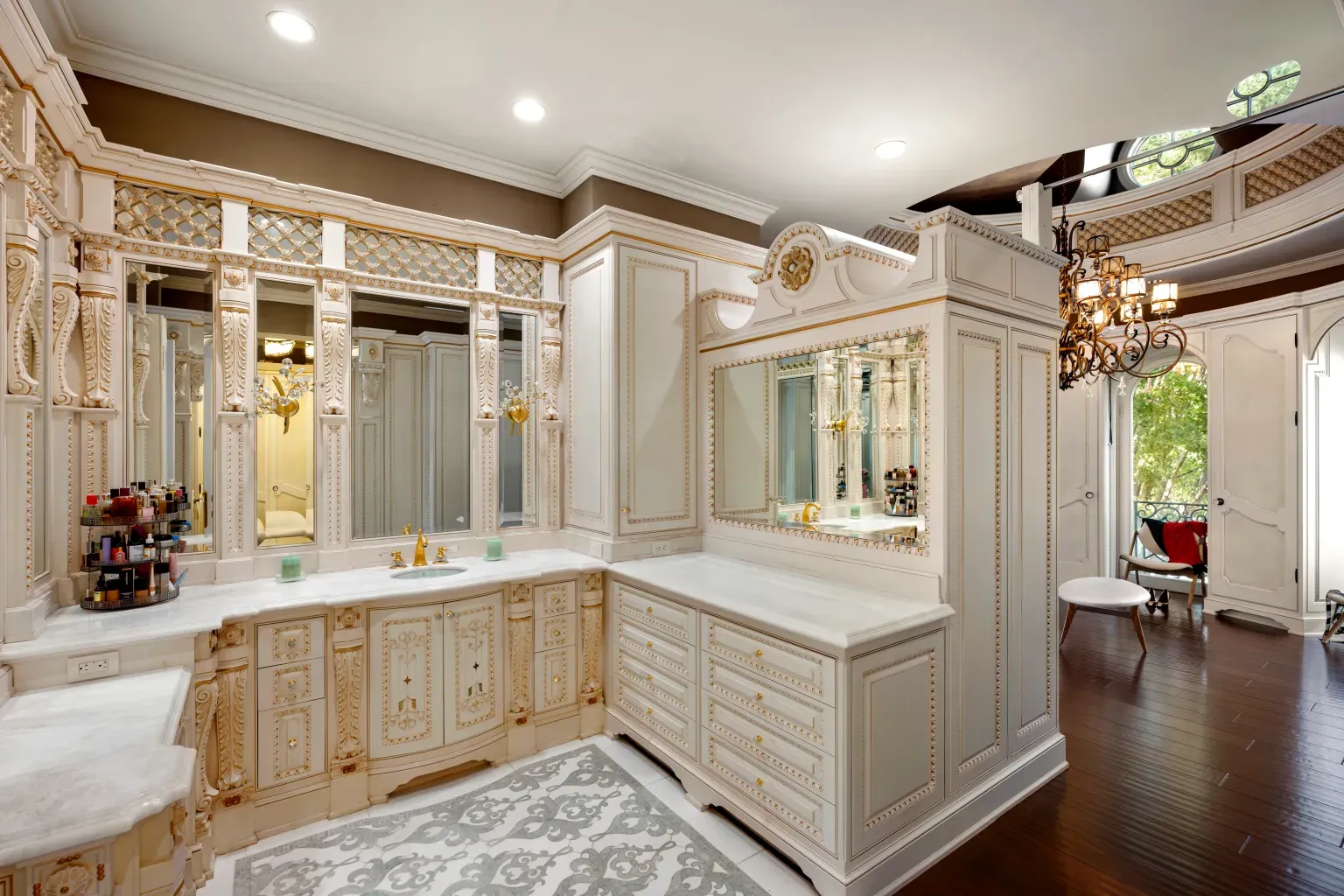 Bathroom goes cream-and-gold hard. Pretty, but maybe too ornate?