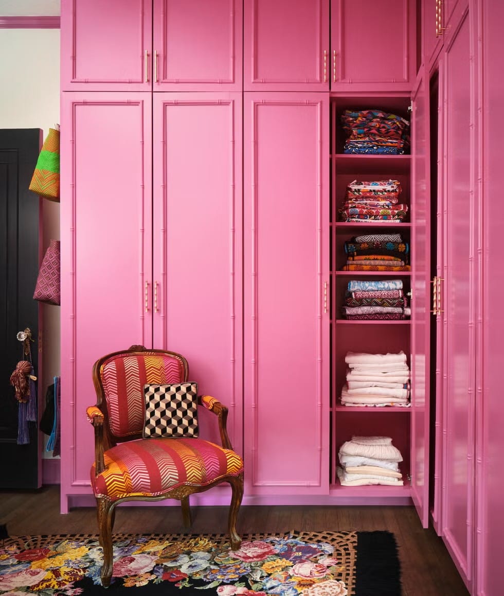 Okay, this closet is neon pink everywhere. Fun or migraine zone?