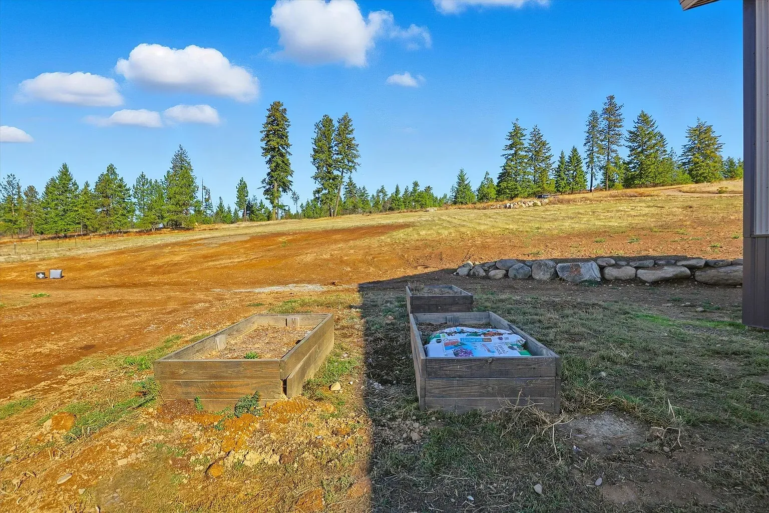 Back outside, raised beds ready for tomatoes. Anyone else smell summer already?