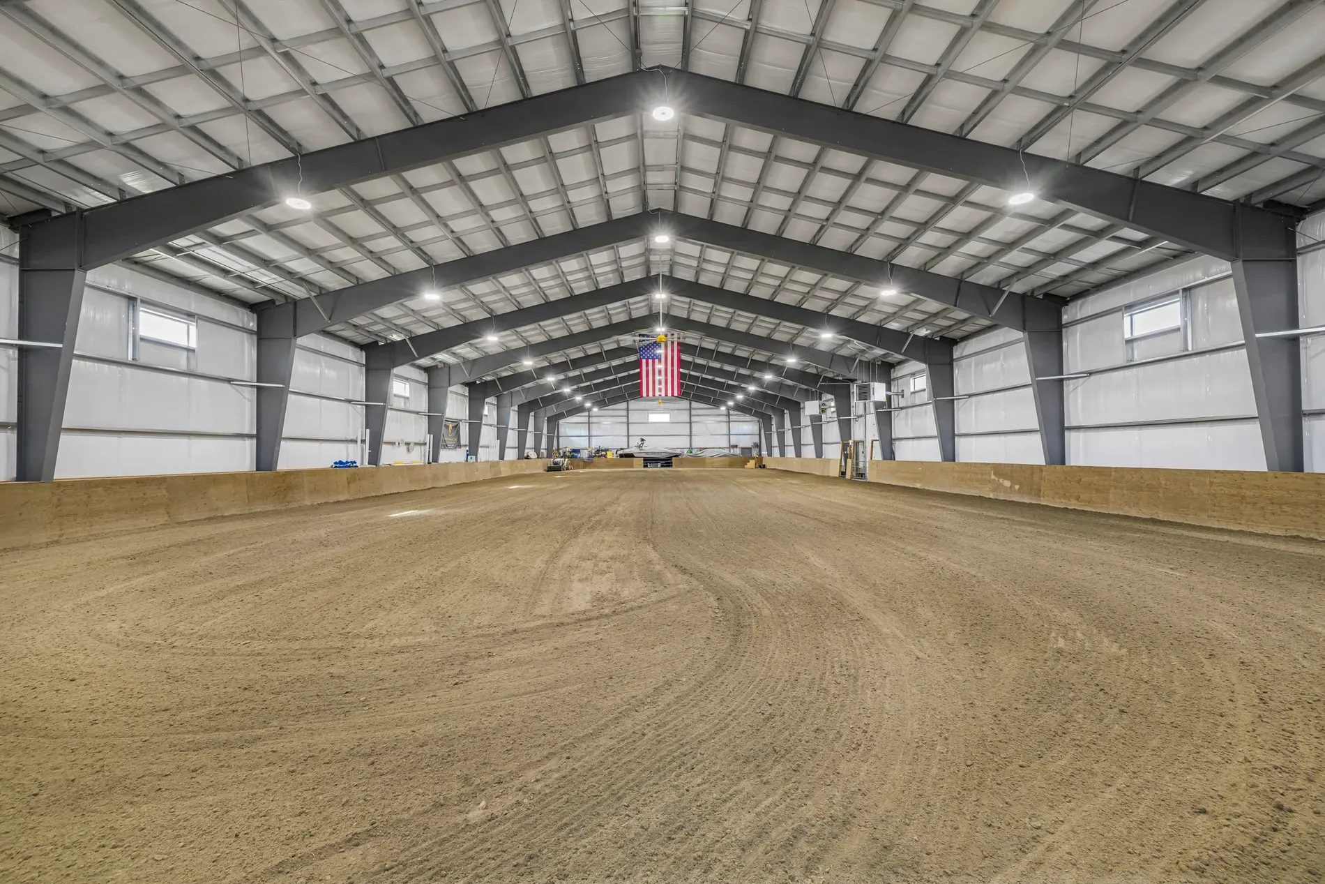 Big indoor arena vibes — gray steel everywhere. Anyone know why they went gray?