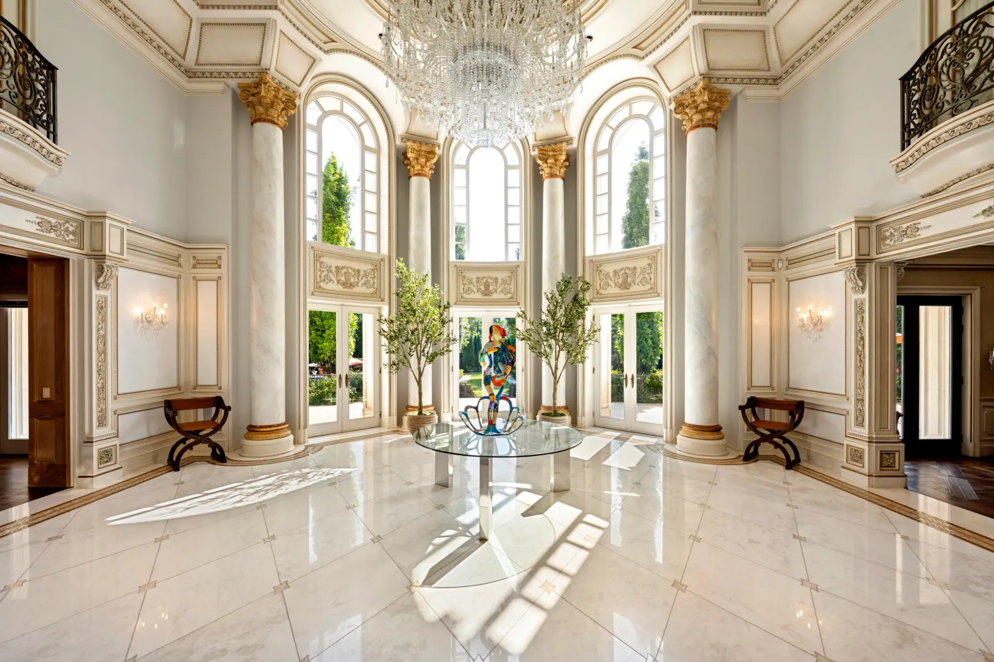 Grand foyer, sky-high ceiling, massive chandelier. Statement made.