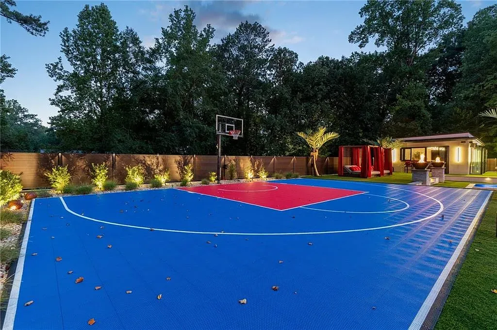 Back outside — blue court, red arc. Anyone know why that color combo?
