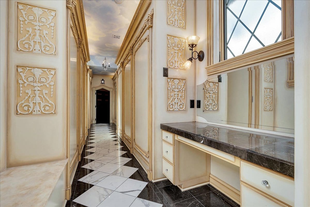 Gilded hallway. Cream and gold for days. Anyone know why they did this?