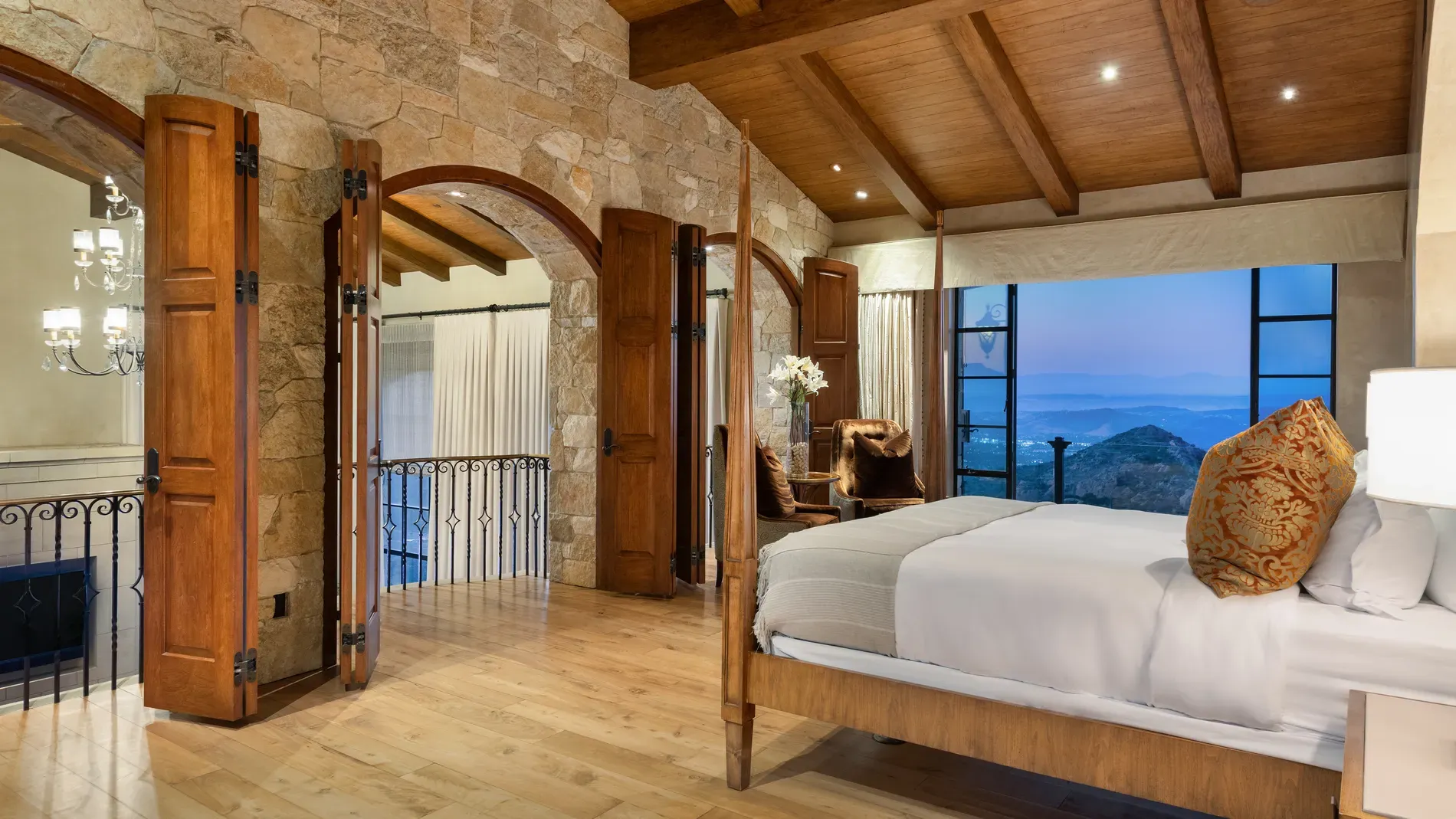 Bedroom beams on display—rustic ceiling, modern pieces. Anyone know why the niche?
