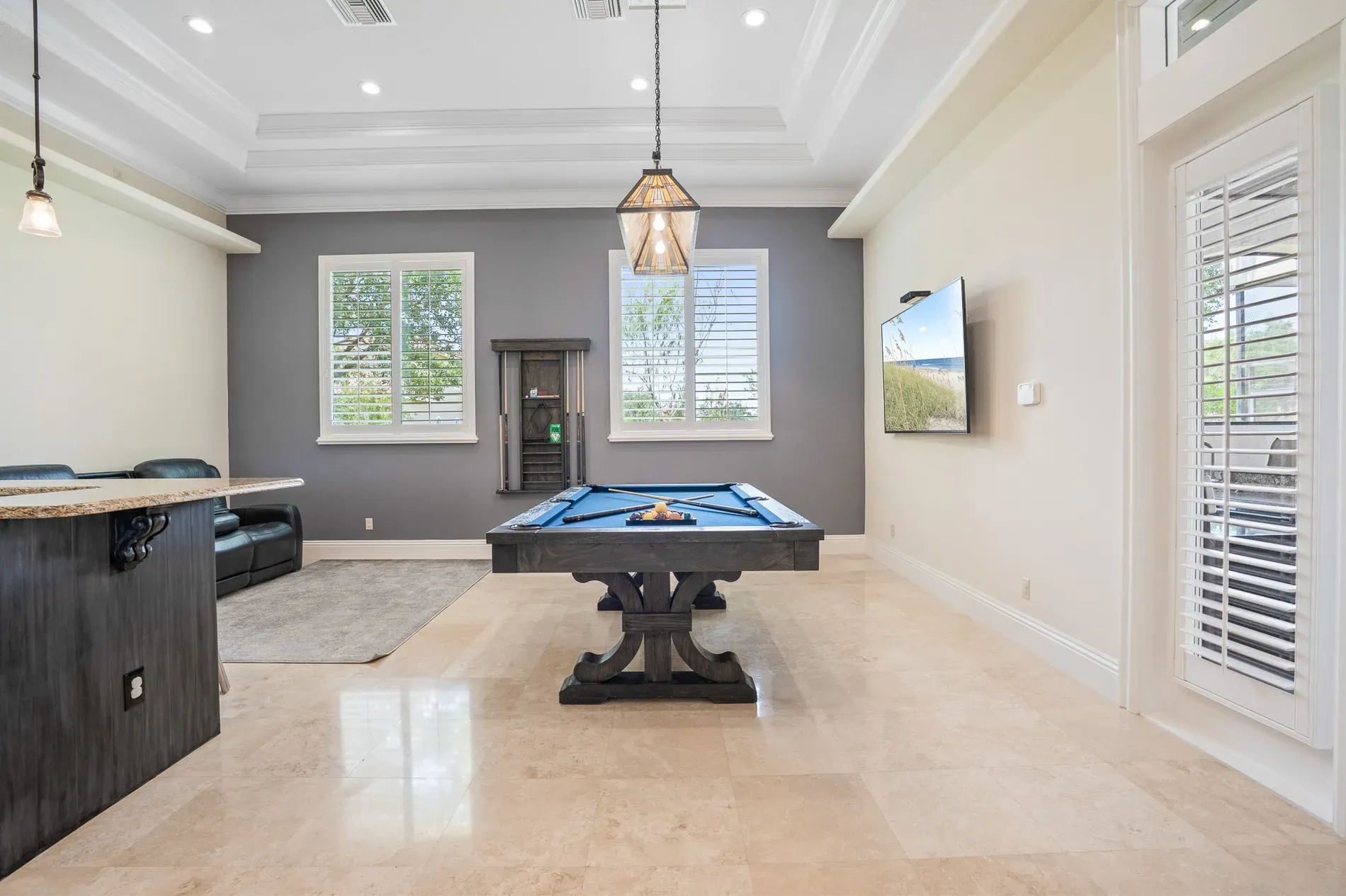 And then a pool table center stage, blue felt popping. Lots of light.